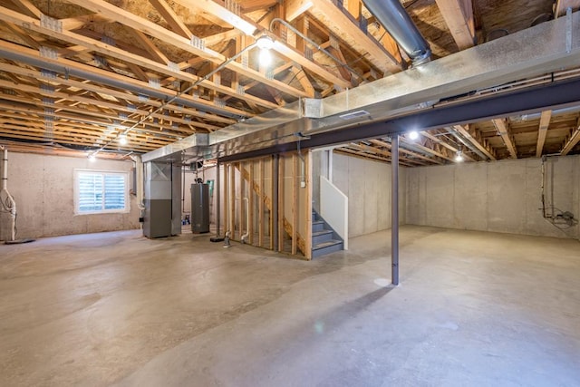 basement with heating unit and gas water heater