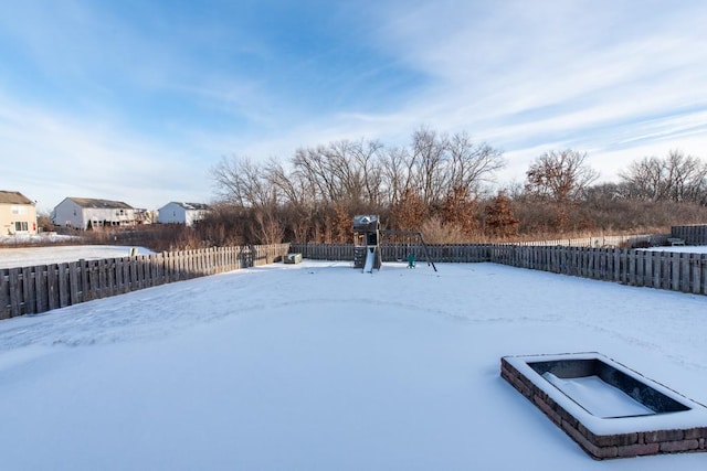 view of yard covered in snow