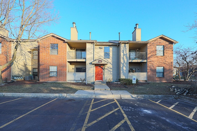 view of building exterior featuring central AC