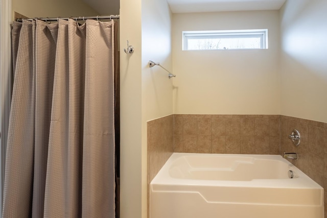 bathroom with a washtub