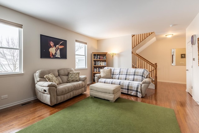 living room with wood-type flooring