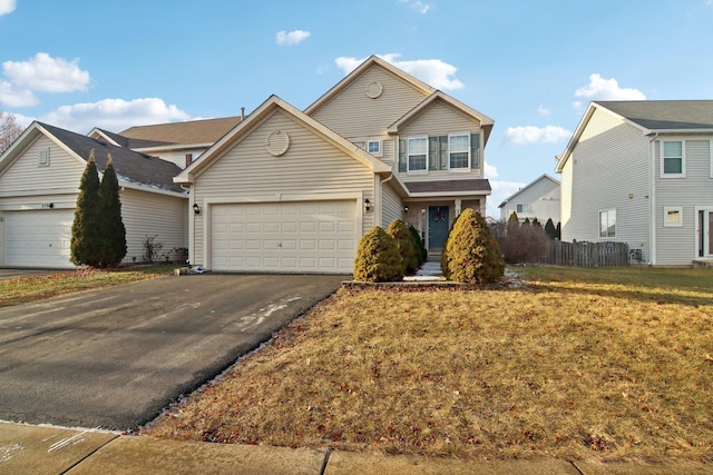 view of front of property with a garage