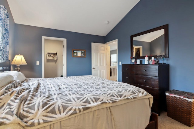 bedroom featuring lofted ceiling