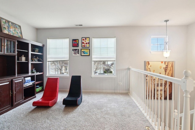 living area with carpet