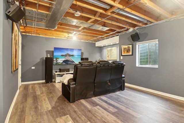 cinema featuring hardwood / wood-style floors