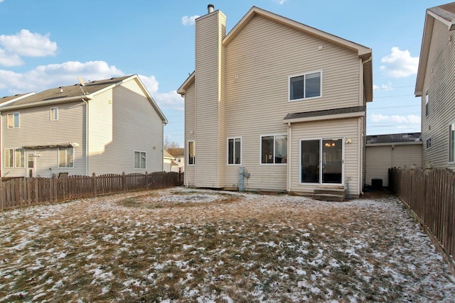 view of snow covered house