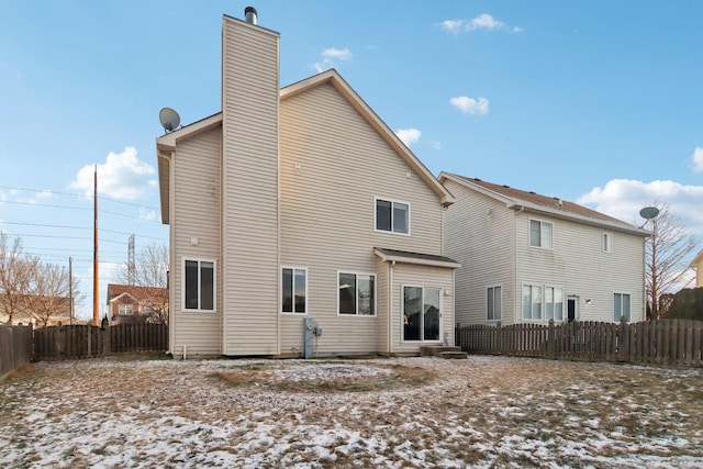 view of snow covered property