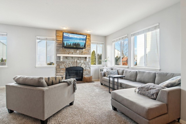 living room featuring a fireplace and carpet