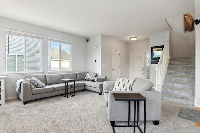 living room featuring light carpet