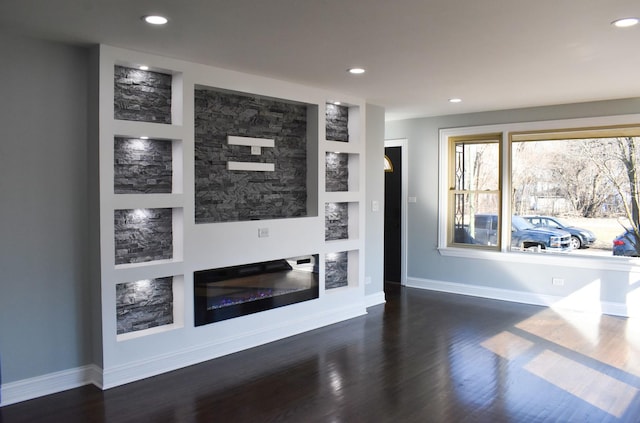 living room with dark hardwood / wood-style flooring