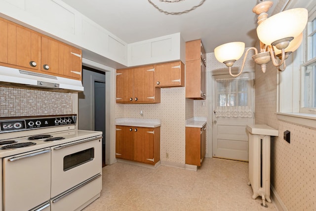 full bathroom with tile walls, backsplash, toilet, shower / bath combination with curtain, and vanity