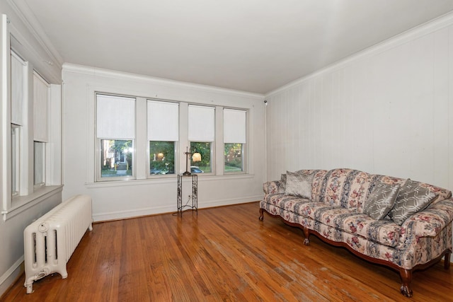 unfurnished room with crown molding, ceiling fan, and dark hardwood / wood-style flooring