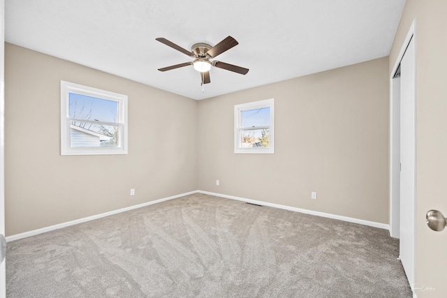 unfurnished bedroom featuring carpet flooring and ceiling fan