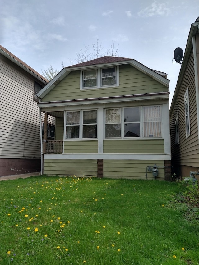 view of property exterior with a yard