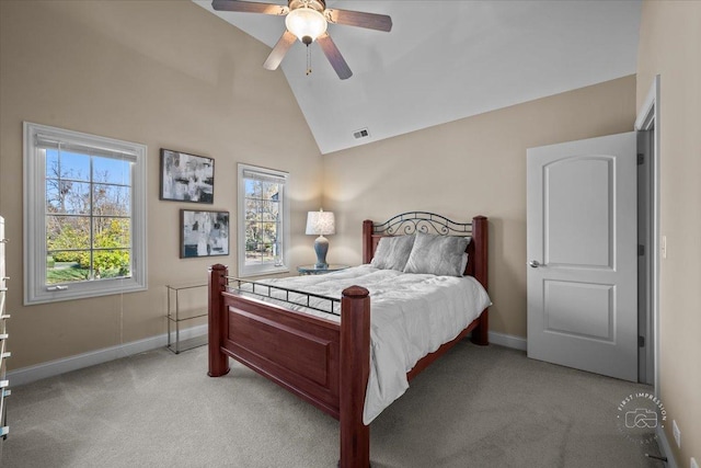 bedroom featuring light carpet, vaulted ceiling, and ceiling fan