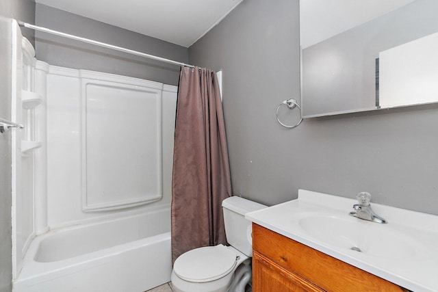 full bathroom with vanity, shower / bath combination with curtain, and toilet