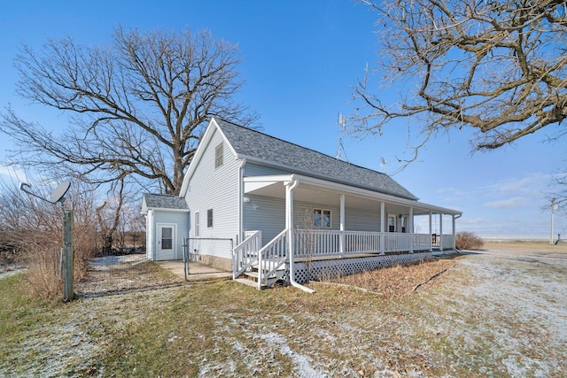 view of front of home featuring covered porch