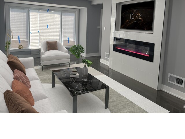 living room featuring dark wood-type flooring