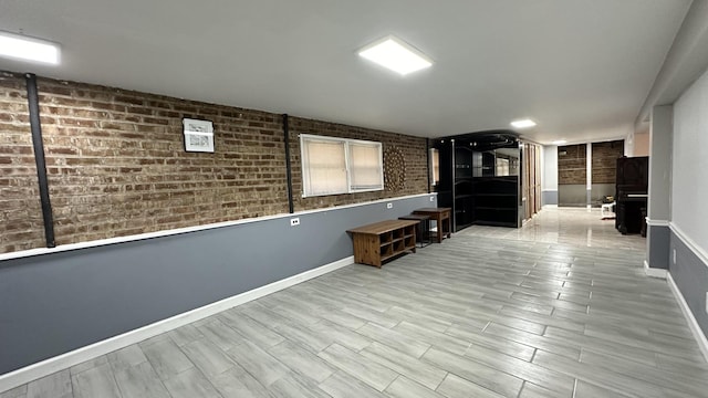 interior space with brick wall