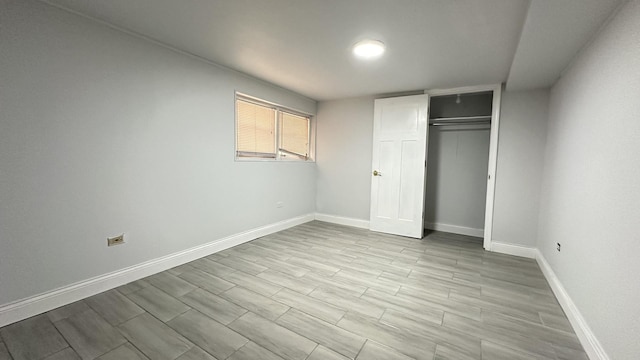 unfurnished bedroom featuring a closet