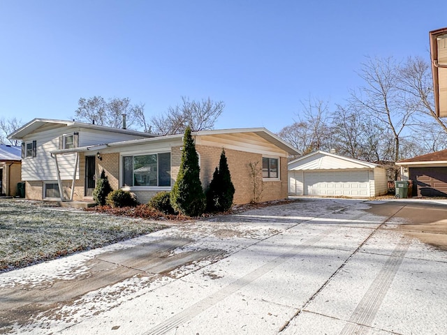 view of front of house with an outbuilding and a garage