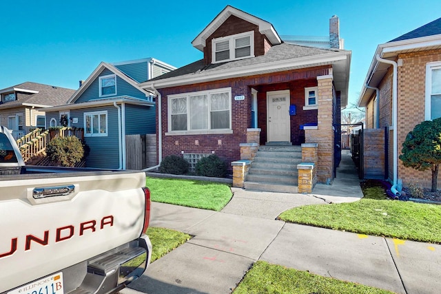 view of front of house with a front lawn