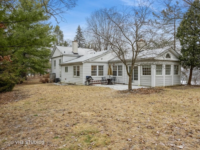 rear view of property with a patio