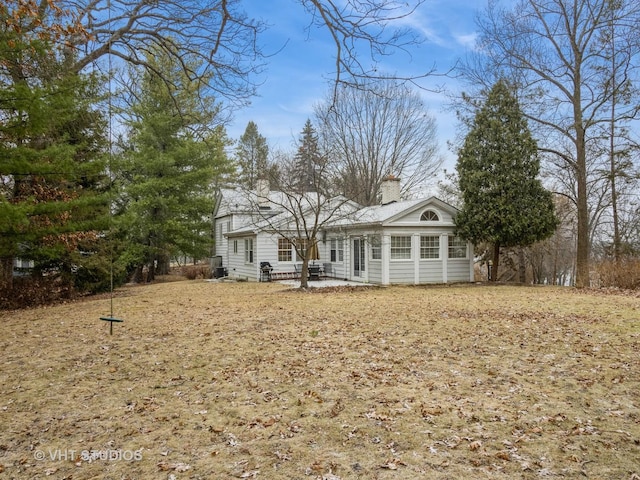 rear view of house featuring a patio