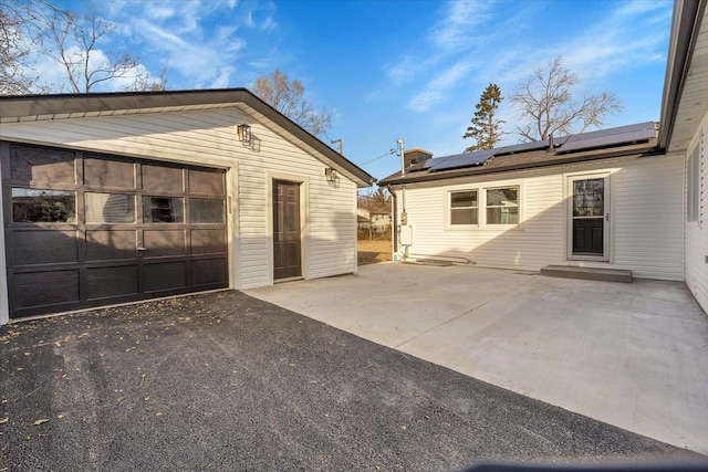 garage with solar panels