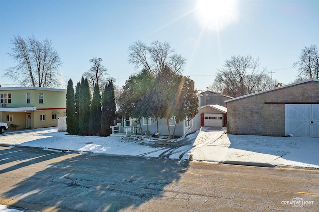 view of front of home featuring an outbuilding