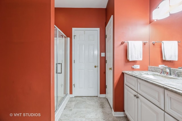 bathroom with vanity and walk in shower