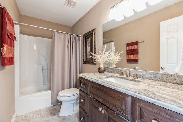 full bathroom with vanity, toilet, and shower / tub combo with curtain