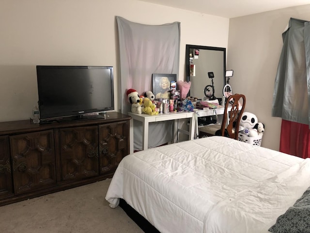 bedroom with light colored carpet