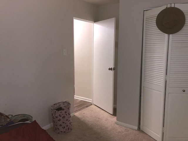 unfurnished bedroom with light carpet