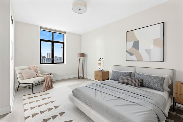 bedroom featuring light hardwood / wood-style floors