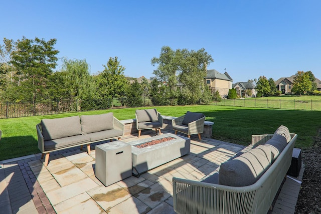 view of patio / terrace featuring an outdoor living space with a fire pit