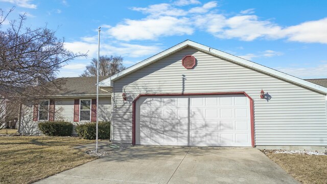 single story home with a garage