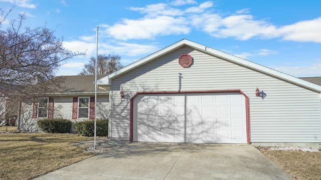 ranch-style home with driveway and a garage