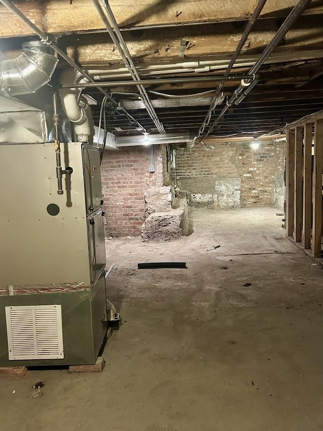 basement featuring heating unit