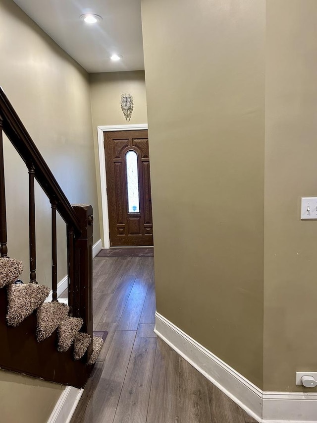 entryway with wood-type flooring