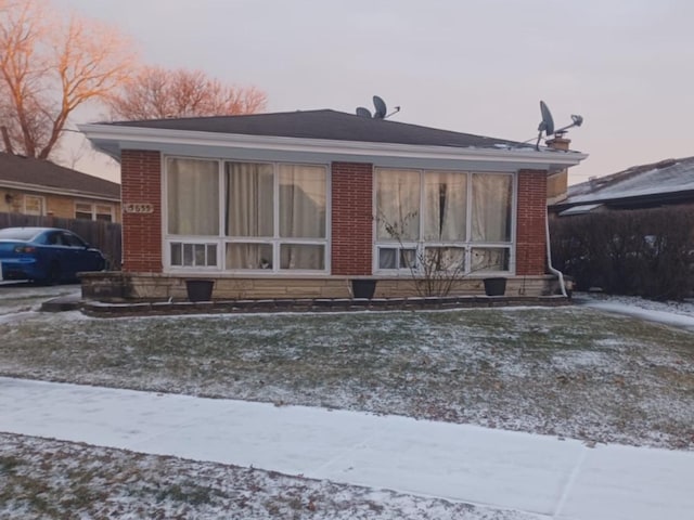 view of snow covered property