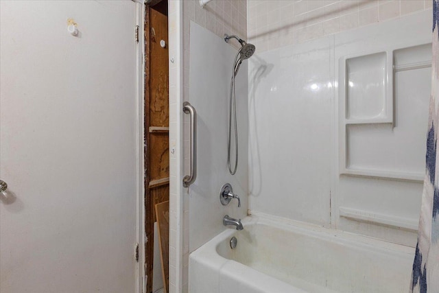 bathroom with shower / bath combination