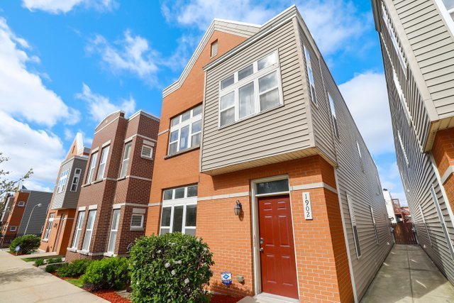 view of front of property with brick siding