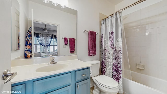 bathroom featuring toilet, ensuite bath, ceiling fan, shower / bathtub combination with curtain, and vanity