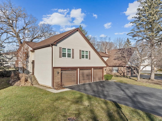 view of property exterior with a garage and a yard