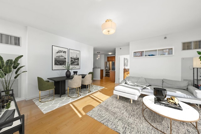 living room with hardwood / wood-style floors