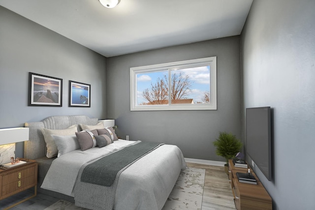 bedroom featuring light wood-type flooring