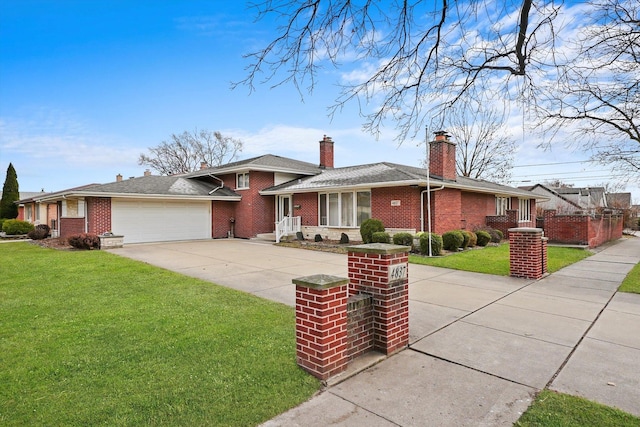 ranch-style house featuring a garage and a front lawn