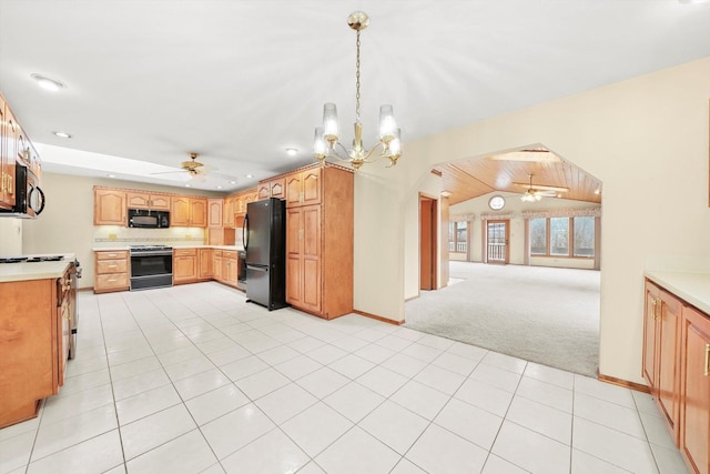 kitchen with ceiling fan with notable chandelier, decorative light fixtures, light colored carpet, and black appliances