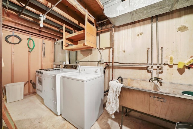 laundry room featuring washer and clothes dryer